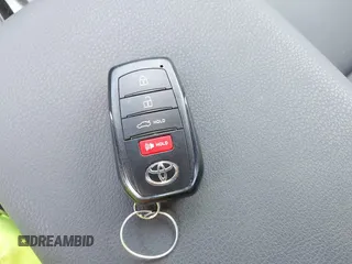 2025 Toyota Camry LE with VIN 4T1DAACK6SU510894, listed as a IAAI auction lot 42048585 with 12,601 mi miles and . Bid and sale history available at DreamBid. Image 11.