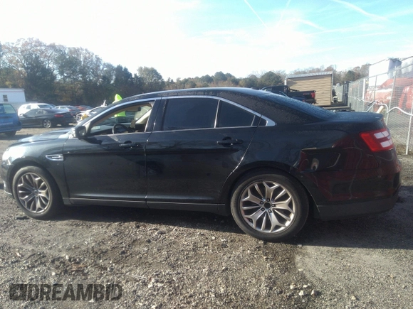 2014 Ford Taurus Limited with VIN 1FAHP2F80EG101504, listed as a IAAI auction lot 40974783 with 177,522 mi miles. Bid and sale history available at carsss.com. Image 14.