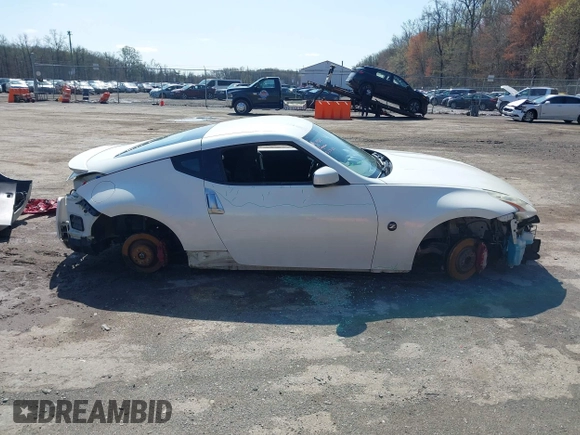 2014 Nissan 370Z with VIN JN1AZ4EH8EM634403, listed as a IAAI auction lot 41923568 with 137,676 mi miles. Bid and sale history available at carsss.com. Image 13.