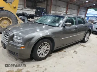 2008 Chrysler 300 Touring z VIN 2C3KA53G98H255852, wystawiony jako Copart lot #60199885 z przebiegiem 197 181 mil mil oraz Szkoda całkowita • Salvage title. Historia ofert i sprzedaży dostępna na DreamBid. Obrazek 1.