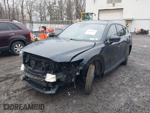 2019 Mazda CX-5 Signature with VIN JM3KFBEY4K0525171, listed as a IAAI auction lot 41706635 with 88,293 mi miles. Bid and sale history available at carsss.com. Image 6.