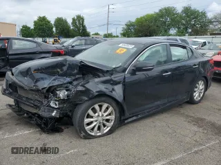 2014 Kia Optima EX z VIN 5XXGN4A76EG307455, wystawiony jako Copart lot #56908525 z przebiegiem 165 707 mil mil oraz Szkody całkowita. Historia ofert i sprzedaży dostępna na DreamBid. Obrazek 1.