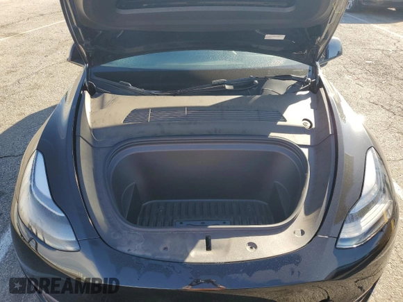2024 Tesla Model Y Long Range z VIN 7SAYGAEE2RF075681, wystawiony jako Copart lot #86433524 z przebiegiem 18 640 mil mil oraz Szkoda całkowita • Salvage title. Historia ofert i sprzedaży dostępna na DreamBid. Obrazek 12.