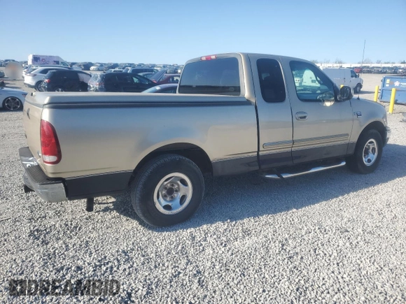 1999 Ford F-150 with VIN 1FTRX17W9XNB77873, listed as a Copart auction lot 52851065 with Not provided miles and Salvage title. Bid and sale history available at DreamBid. Image 3.
