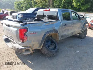 2024 Chevrolet Colorado 4WD Trail Boss with VIN 1GCPTEEK8R1307923, listed as a IAAI auction lot 42423905 with 4,190 mi miles and . Bid and sale history available at DreamBid. Image 4.