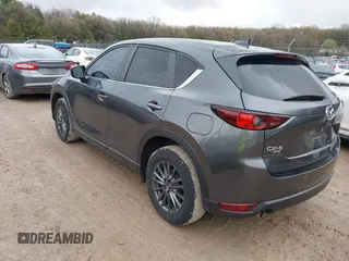2020 Mazda CX-5 Touring with VIN JM3KFBCM2L0850855, listed as a IAAI auction lot 42147339 with 75,955 mi miles and . Bid and sale history available at carsss.com. Image 3.