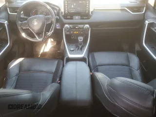 2021 Toyota RAV4 Hybrid XSE z VIN 4T3E6RFV9MU041188, wystawiony jako Copart lot #52697145 z przebiegiem 95 115 mil mil oraz Szkoda całkowita • Salvage title. Historia ofert i sprzedaży dostępna na DreamBid. Obrazek 8.
