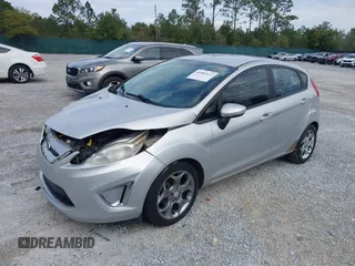 2011 Ford Fiesta SES with VIN 3FADP4FJ5BM232264, listed as a IAAI auction lot 40982622 with 184,726 mi miles. Bid and sale history available at carsss.com. Image 17.