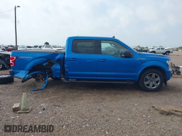 2019 Ford F-150 XL with VIN 1FTEW1C53KKC20063, listed as a IAAI auction lot 41928957 with 74,668 mi miles and . Bid and sale history available at DreamBid. Image 14.