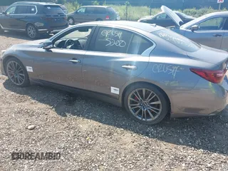 2018 Infiniti Q50 Red Sport 400 with VIN JN1FV7AP7JM461628, listed as a IAAI auction lot 42622062 with 58,561 mi miles and . Bid and sale history available at DreamBid. Image 3.