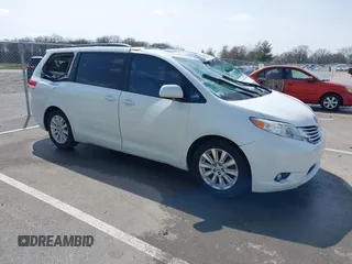 2011 Toyota Sienna XLE AAS with VIN 5TDYK3DC8BS085477, listed as a IAAI auction lot 41934541 with 131,768 mi miles and . Bid and sale history available at DreamBid. Image 1.