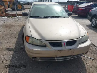 2003 Pontiac Grand Am SE with VIN 1G2NE52F73C171244, listed as a IAAI auction lot 41572797 with 5 mi miles. Bid and sale history available at carsss.com. Image 6.