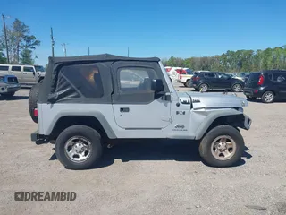 2006 Jeep Wrangler X with VIN 1J4FA39S86P743660, listed as a IAAI auction lot 41890339 with 198,099 mi miles and . Bid and sale history available at DreamBid. Image 13.