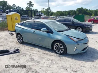 2017 Toyota Prius Two with VIN JTDKARFU1H3036374, listed as a IAAI auction lot 42522030 with 101,127 mi miles and . Bid and sale history available at DreamBid. Image 1.