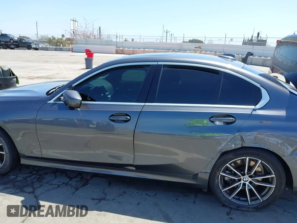 2020 BMW 3 Series 330i z VIN 3MW5R1J03L8B17207, wystawiony jako IAAI lot #42090508 z przebiegiem 105 982 mil mil oraz . Historia ofert i sprzedaży dostępna na DreamBid. Obrazek 14.