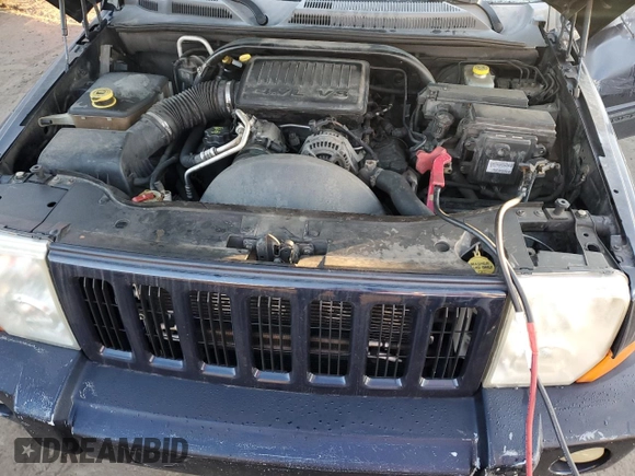 2006 Jeep Commander with VIN 1J8HH48N86C128361, listed as a Copart auction lot 77609564 with 142,660 mi miles and Clean Title. Bid and sale history available at carsss.com. Image 13.