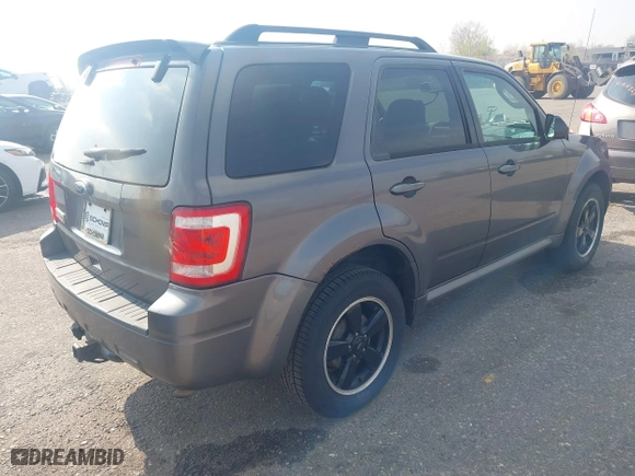 2011 Ford Escape XLT with VIN 1FMCU9D78BKC39019, listed as a IAAI auction lot 41903813 with 226,401 mi miles. Bid and sale history available at carsss.com. Image 4.