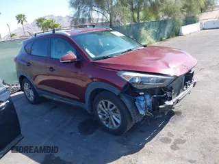 2016 Hyundai Tucson Limited with VIN KM8J33A26GU063454, listed as a IAAI auction lot 41975782 with 74,519 mi miles. Bid and sale history available at carsss.com. Image 1.