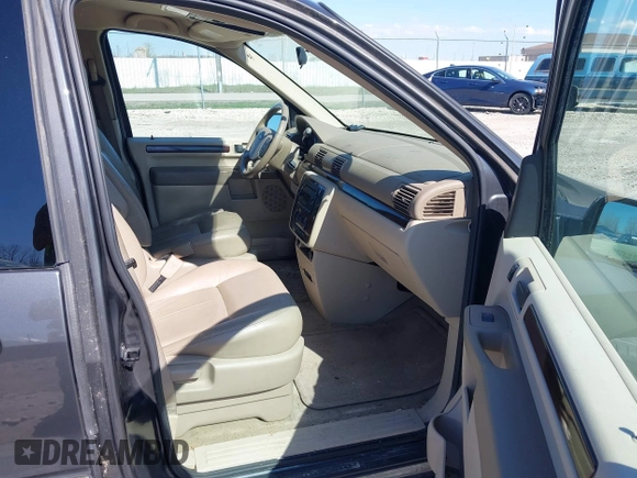2007 Ford Freestar SEL z VIN 2FMDA52257BA11056, wystawiony jako IAAI lot #42177243 z przebiegiem 171 532 mil mil oraz . Historia ofert i sprzedaży dostępna na DreamBid. Obrazek 5.