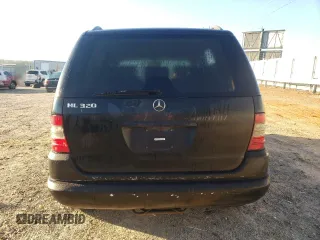 1999 Mercedes-Benz M-Class with VIN 4JGAB54E0XA118194, listed as a Copart auction lot 75242784 with 284,187 mi miles and Salvage Title. Bid and sale history available at carsss.com. Image 6.