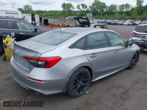 2023 Honda Civic Sport with VIN 2HGFE2F55PH501595, listed as a IAAI auction lot 42355942 with 8,924 mi miles and . Bid and sale history available at DreamBid. Image 4.