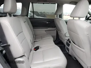 2018 Honda Pilot Touring z VIN 5FNYF6H94JB039992, wystawiony jako Copart lot #57128435 z przebiegiem 85 578 mil mil oraz Szkoda całkowita • Salvage title. Historia ofert i sprzedaży dostępna na DreamBid. Obrazek 11.
