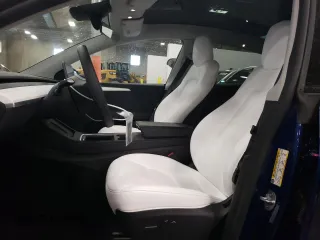 2023 Tesla Model Y Long Range with VIN 7SAYGDEE7PA180793, listed as a Copart auction lot 46706855 with 18,136 mi miles and Non Repairable. Bid and sale history available at DreamBid. Image 7.