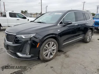 2023 Cadillac XT6 FWD Premium Luxury с VIN 1GYKPCRS5PZ220616, выставлен на аукционе Copart как лот 65266635 с пробегом 25 860 миль миль и Списание • Salvage title. История ставок и продаж доступна на DreamBid. Изображение 1.