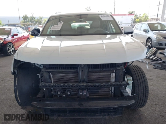 2018 Volkswagen Atlas SE with VIN 1V2CR2CAXJC594811, listed as a IAAI auction lot 42408595 with 65,247 mi miles and . Bid and sale history available at DreamBid. Image 13.