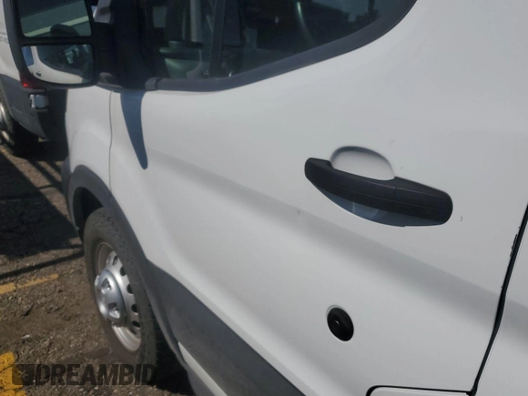 2023 Ford Transit Passenger XL z VIN 1FBAX9C86PKA70756, wystawiony jako IAAI lot #42731060 z przebiegiem 23 399 mil mil oraz . Historia ofert i sprzedaży dostępna na DreamBid. Obrazek 5.