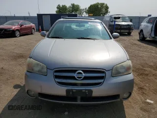 2002 Nissan Maxima GLE z VIN JN1DA31A62T000726, wystawiony jako Copart lot #71235864 z przebiegiem 219 647 mil mil oraz Szkoda całkowita • Salvage title. Historia ofert i sprzedaży dostępna na DreamBid. Obrazek 5.