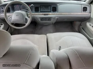 2000 Ford Crown Victoria with VIN 2FAFP73W6YX117101, listed as a Copart auction lot 66004304 with 124,011 mi miles and Clean Title. Bid and sale history available at carsss.com. Image 8.
