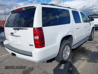 2010 Chevrolet Suburban LT with VIN 1GNUCJE05AR210539, listed as a IAAI auction lot 41805107 with 166,305 mi miles and . Bid and sale history available at DreamBid. Image 4.