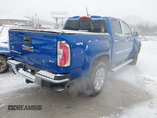 2018 GMC Canyon 4WD SLT with VIN 1GTG6DEN4J1135258, listed as a IAAI auction lot 41591180 with 66,820 mi miles. Bid and sale history available at carsss.com. Image 4.