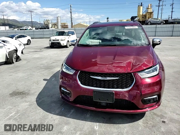 2023 Chrysler Pacifica Limited with VIN 2C4RC3GG9PR605377, listed as a Copart auction lot 51781805 with 7,606 mi miles and Salvage title. Bid and sale history available at DreamBid. Image 12.