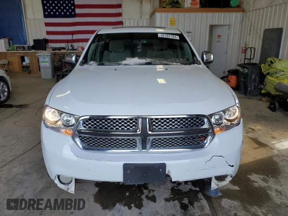 2013 Dodge Durango SXT with VIN 1C4RDJAG4DC564946, listed as a Copart auction lot 44162164 with 103,849 mi miles and Clean title. Bid and sale history available at DreamBid. Image 5.