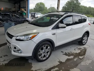 2013 Ford Escape SEL with VIN 1FMCU0H91DUB90163, listed as a Copart auction lot 64091785 with 156,038 mi miles and Salvage title. Bid and sale history available at DreamBid. Image 1.