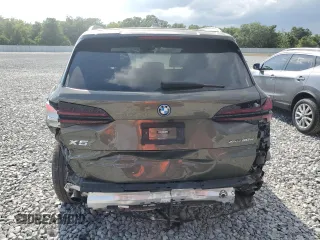 2024 BMW X5 xDrive50e z VIN 5UX43EU07R9S85366, wystawiony jako Copart lot #54894225 z przebiegiem 21 712 mil mil oraz Szkody całkowita. Historia ofert i sprzedaży dostępna na DreamBid. Obrazek 6.