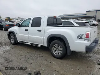 2006 Mitsubishi Raider z VIN 1Z7HT38K16S538273, wystawiony jako Copart lot #79407094 z przebiegiem 67 758 mil mil oraz Szkoda całkowita • Salvage title. Historia ofert i sprzedaży dostępna na DreamBid. Obrazek 2.