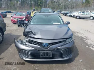 2019 Toyota Camry Hybrid LE z VIN 4T1B31HK0KU509265, wystawiony jako IAAI lot #42014204 z przebiegiem 136 560 mil mil oraz . Historia ofert i sprzedaży dostępna na DreamBid. Obrazek 12.
