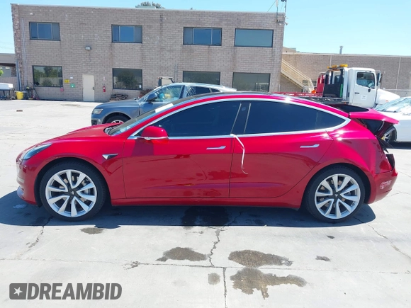 2018 Tesla Model 3 Long Range Battery z VIN 5YJ3E1EAXJF048839, wystawiony jako IAAI lot #42328412 z przebiegiem 83 083 mil mil oraz . Historia ofert i sprzedaży dostępna na DreamBid. Obrazek 14.