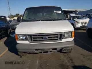 2004 Ford Econoline Passenger XL with VIN 1FMRE11W84HA50164, listed as a Copart auction lot 73438464 with 148,916 mi miles and Clean Title. Bid and sale history available at DreamBid. Image 5.
