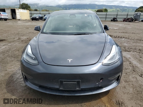 2023 Tesla Model 3 with VIN 5YJ3E1EA8PF677153, listed as a Copart auction lot 51065165 with 27,088 mi miles and Salvage Title. Bid and sale history available at carsss.com. Image 5.