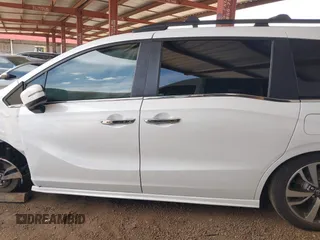2021 Honda Odyssey Touring z VIN 5FNRL6H85MB034888, wystawiony jako IAAI lot #42386984 z przebiegiem 40 514 mil mil oraz . Historia ofert i sprzedaży dostępna na DreamBid. Obrazek 14.