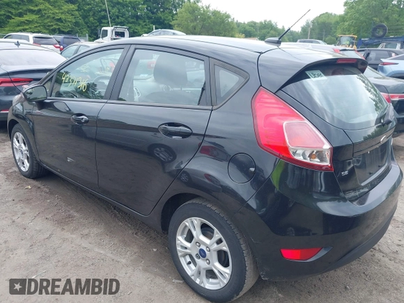 2014 Ford Fiesta SE z VIN 3FADP4EJ3EM205098, wystawiony jako IAAI lot #42371316 z przebiegiem 130 420 mil mil oraz . Historia ofert i sprzedaży dostępna na DreamBid. Obrazek 3.