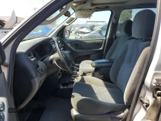 2004 Mazda Tribute LX with VIN 4F2YZ941X4KM21993, listed as a Copart auction lot 69283134 with 222,736 mi miles and Clean Title. Bid and sale history available at carsss.com. Image 7.