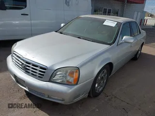 2002 Cadillac DeVille DTS with VIN 1G6KF57972U262315, listed as a IAAI auction lot 41537606 with 151,664 mi miles. Bid and sale history available at carsss.com. Image 2.