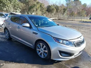 2012 Kia Optima SX z VIN 5XXGR4A6XCG030348, wystawiony jako IAAI lot #41002991 z przebiegiem 170 010 mil mil oraz . Historia ofert i sprzedaży dostępna na DreamBid. Obrazek 1.