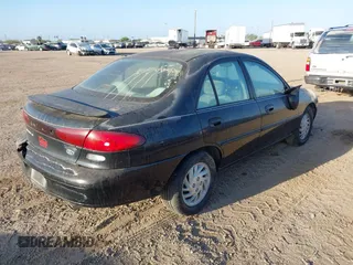 1998 Ford Escort SE with VIN 1FAFP13P3WW192028, listed as a IAAI auction lot 41754237 with 140,000 mi miles. Bid and sale history available at carsss.com. Image 4.