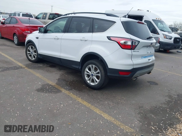 2018 Ford Escape SE z VIN 1FMCU9GD0JUC62783, wystawiony jako IAAI lot #41488153 z przebiegiem 55 774 mil mil oraz . Historia ofert i sprzedaży dostępna na DreamBid. Obrazek 3.